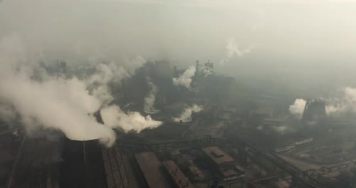 Top View of the Metallurgical Plant. Smoke Coming Out of Factory Pipes. Ecology