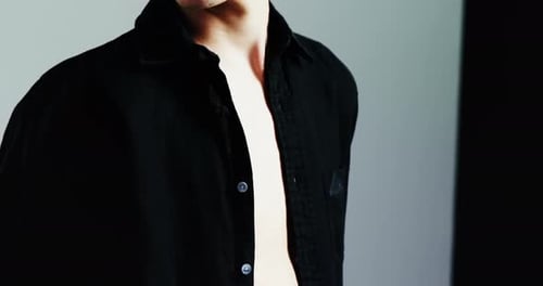 Androgynous man posing in studio