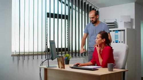 People Working Collaboratively in an Office Environment