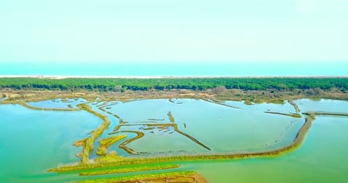 Shallow Azure Venetian Lagoon with Barene Island Formations
