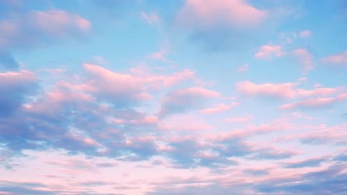 Pink Clouds Time Lapse in a Blue Sky