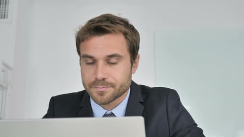 Close Up of Businessman Busy Doing Video Chat in Office