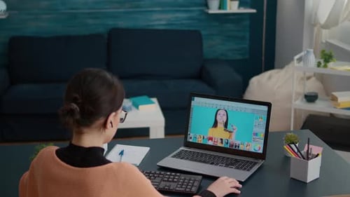 Photography Student Using Retouching Software to Edit Picture