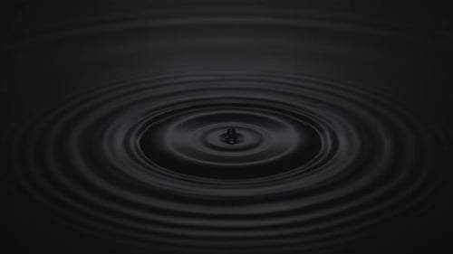 Water Droplets Rippling Black Liquid Surface