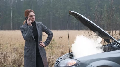 Woman on Countryside Road Trying To Get Help with Her Broken Down Car and Call