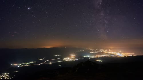 Milky Way over the city, 4K