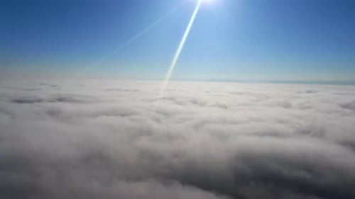 Sun Above Blanket of White Clouds in Sky