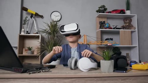 Boy Wearing VR Headset Playing Video Game