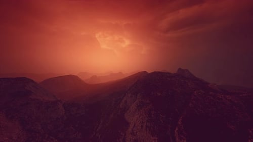 Dramatic Sky Over Rocky Mountains at Sunset