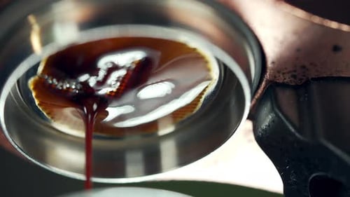 4K Close up of Flair espresso coffee machine pouring hot espresso shot