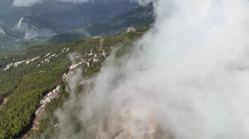 Cloudy landscape high in the mountains aerial view 4 K