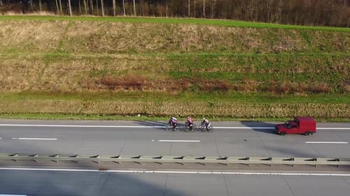 Highway Cycling with Car Aerial View