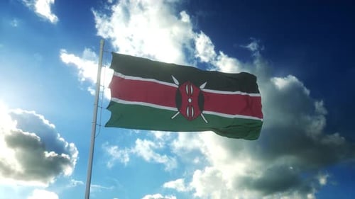 Vibrant Kenyan Flag Waving Against Blue Sky