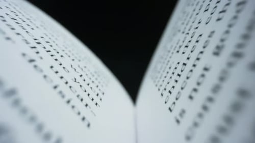 Close-Up Pages of Book Turning