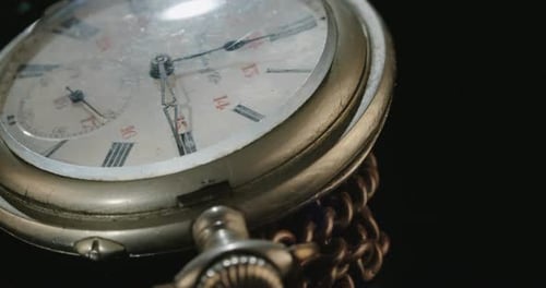Antique Pocket Watch with Silver Chain Close Up