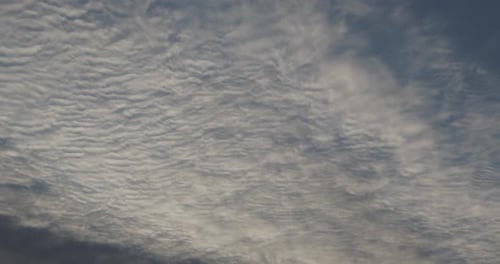 White Clouds Move Quickly Across The Sky