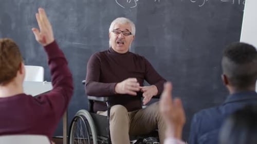 Professor Lectures Students in University Classroom