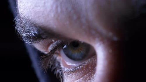 Intense Closeup of Human Eye Opening