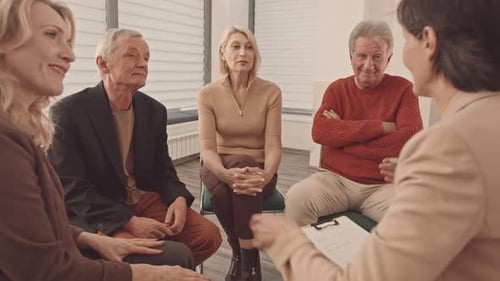 Adults Connecting in a Group Therapy Session