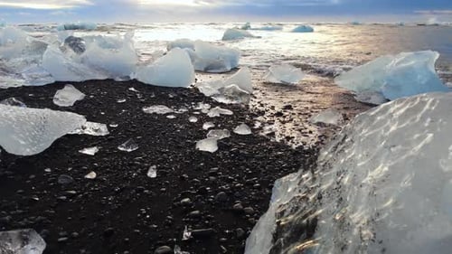 Icebergs on a Black Volcanic Beach Chunk of Ice in Iceland Arctic Landscape Winter Concept