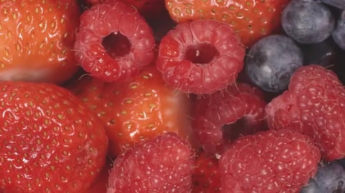 Fresh Berries Close-Up: Strawberries, Raspberries, Blueberries