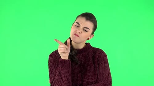Young Girl Thinks About Something, and Then an Idea Comes To Her. Green Screen