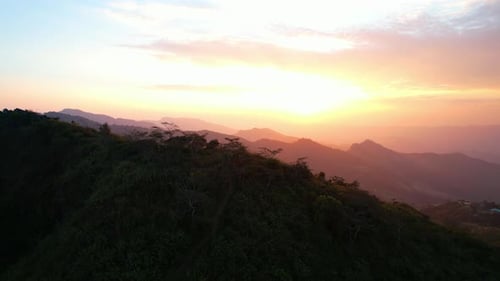 4K Aerial view over the mountains at sunset. Drone Flight Footage