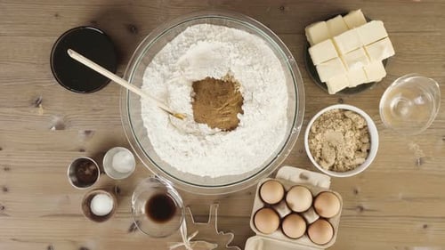Time lapse. Step by step. Mixing dry ingredients for double batch of gingerbread cookies.