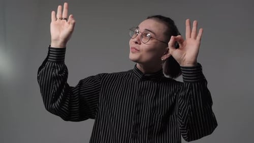 Smiling Person Posing in Black and White Shirt