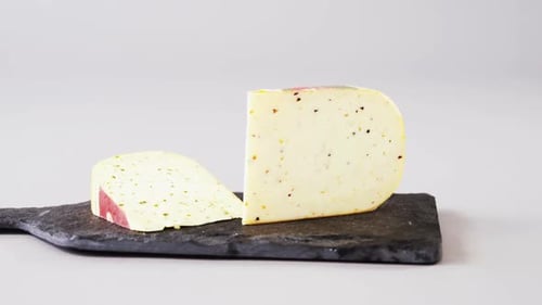 Cheese with Herbs on a Stone Board