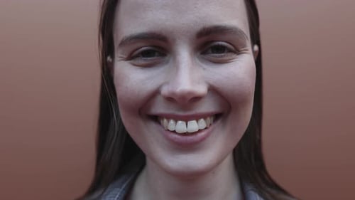 Happy Ukrainian Female Looking at Camera Standing in City Street