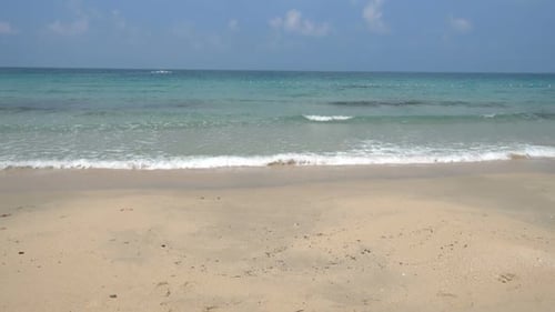 Beautiful tropical beach sea ocean with blue sky and white cloud