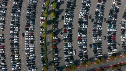 Aerial Top View of the Supermarket Parking Lot with Lots of Cars.