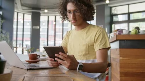 Man using digital tablet