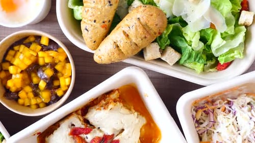 Variety of Take-Out Food in Bowls and Containers