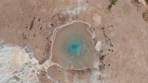 Aerial Birds Eye Overhead Top Down Descending Footage of Geysir Lagoon with Hot Water