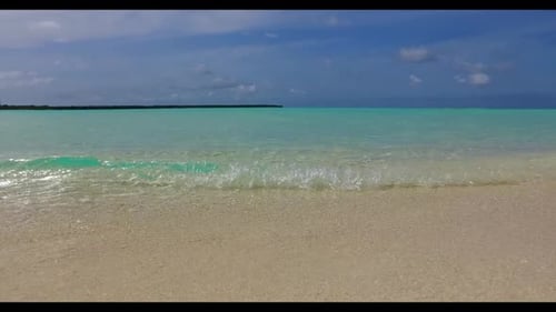 Aerial above texture of tranquil coastline beach journey by blue water and white sand background of