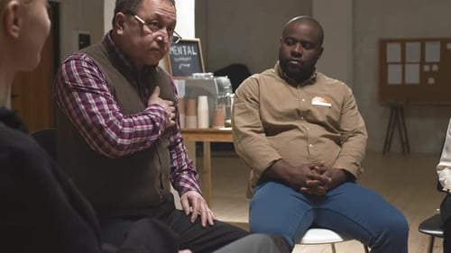 Adults Attending Group Therapy Session