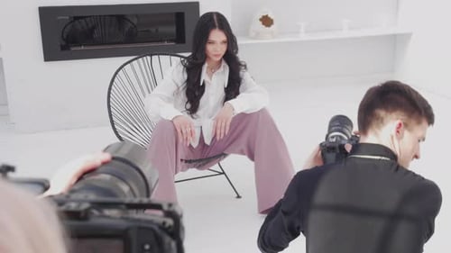 Fashionable Woman Posing in Studio for Photoshoot