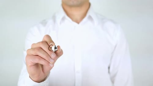 Hand Writes the Word Celebration With Marker