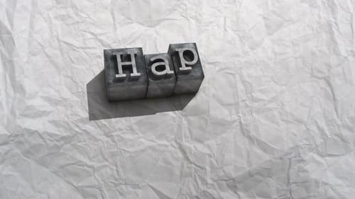 Letterpress Happy Birthday Text Reveal on Crumpled Paper