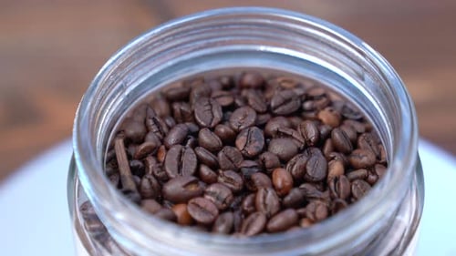 Roasted Coffee Beans in a Jar, Close Up