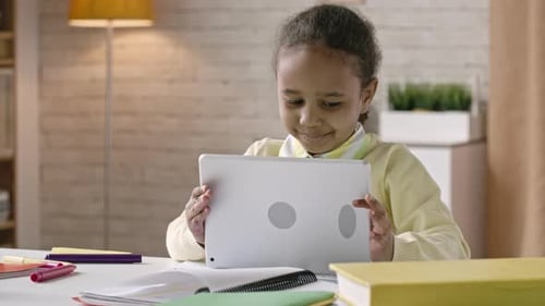 Little Cutie Using Tablet