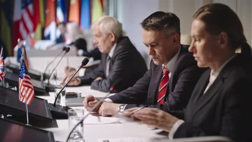 Group of People at Political Meeting