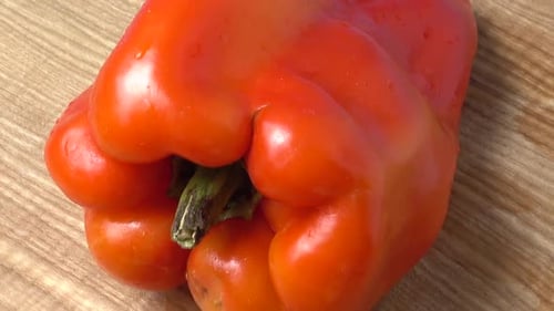 Close Up of Fresh Red Pepper on Wood