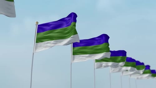 Komi Republic Flags Waving Seamlessly in Clear Blue Sky