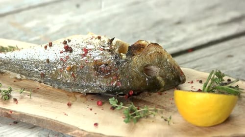 Lemon Squeezed on Prepared Gourmet Fish Dish