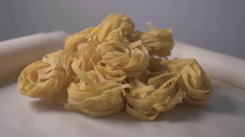 Pile of Fresh Tagliatelle Pasta Nests