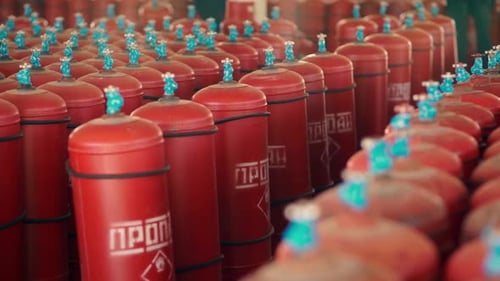Propane Tanks Lined Up in a Factory