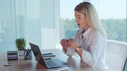 Businesswoman Feels Suffocated Turn on Air Conditioner Using Remote Control